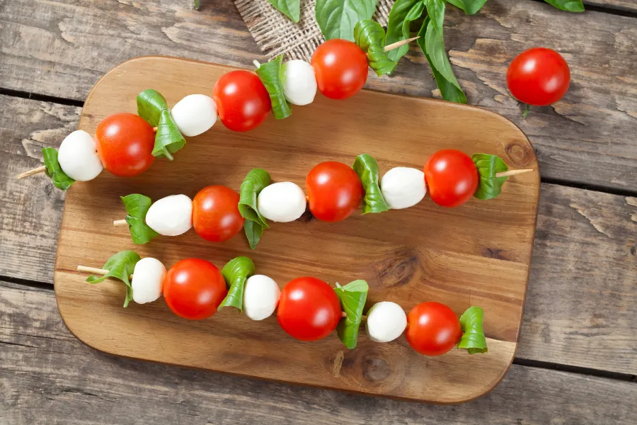 Caprese salad on kababs with home-grown tomatoes and fresh basil