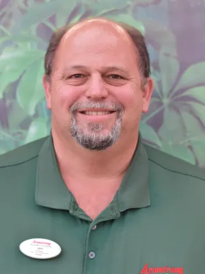 a man in a green shirt