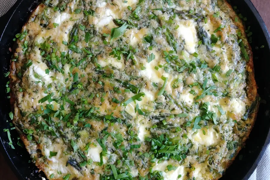 a frittata in a metal pan