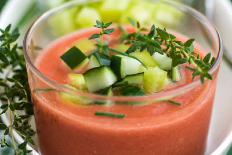 a close up of a bowl of gazpacho