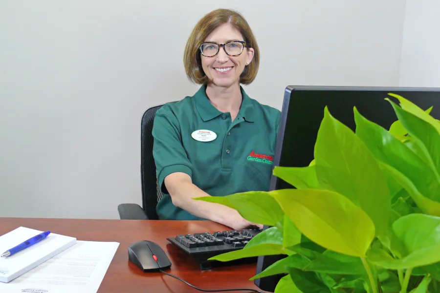 An Armstrong Associate scheduling a landscape design
